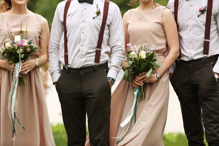 Two Bridesmaids and Two Groomsmen standing side by side